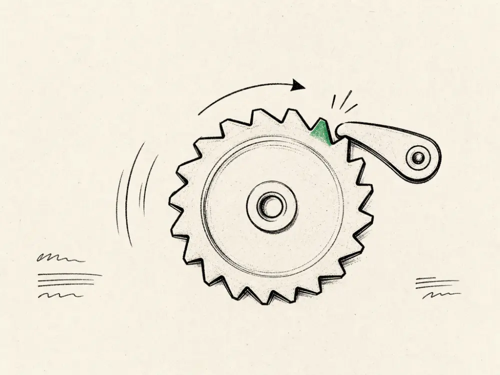 An ink ratchet wheel with a pawl turning one notch forward, one tooth brand green