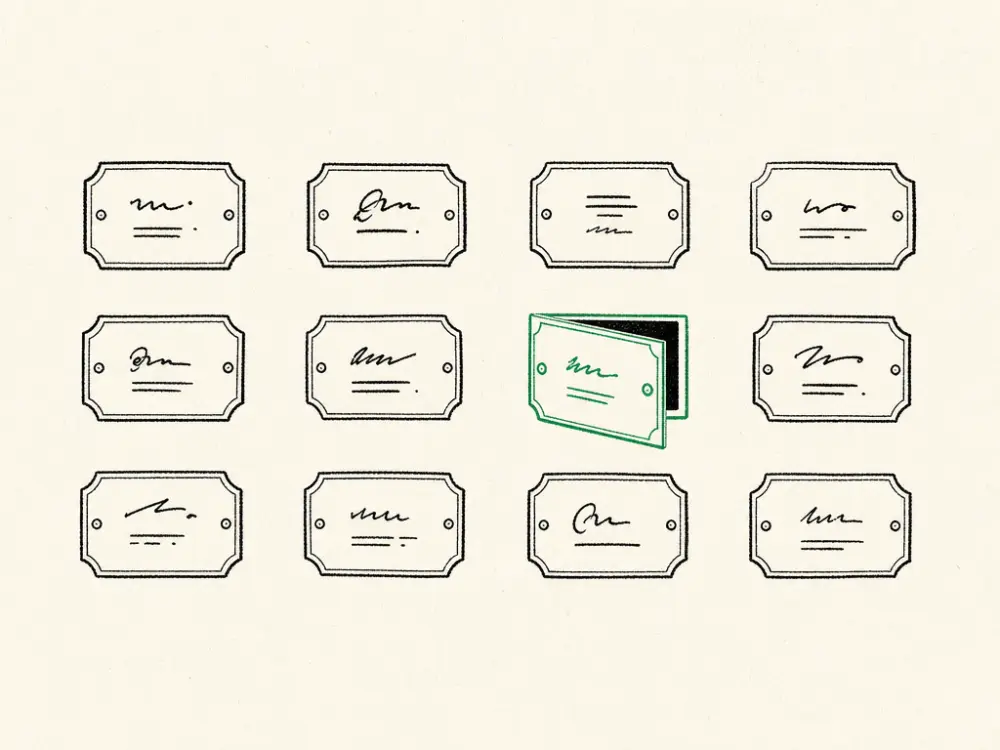 A grid of small ink door plaques with one brand-green plaque standing slightly ajar