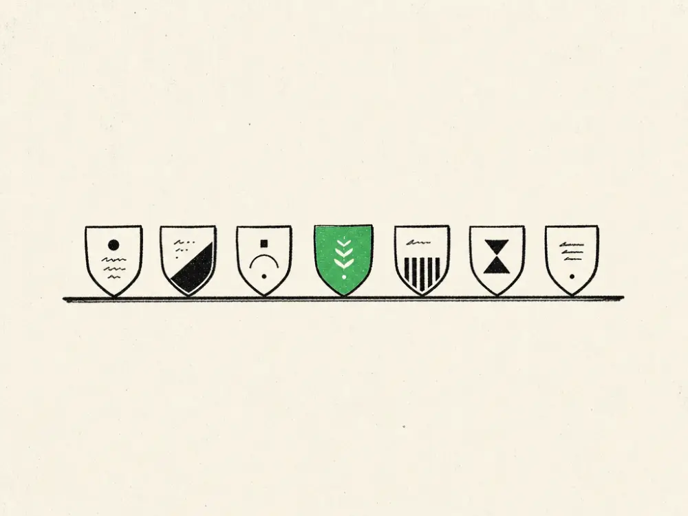 A shelf row of ink badge shields, the central shield filled solid brand green