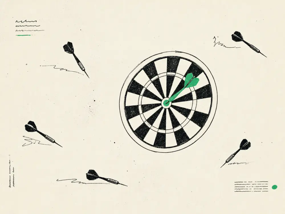 An ink dartboard with darts scattered wide and one green dart in the bullseye