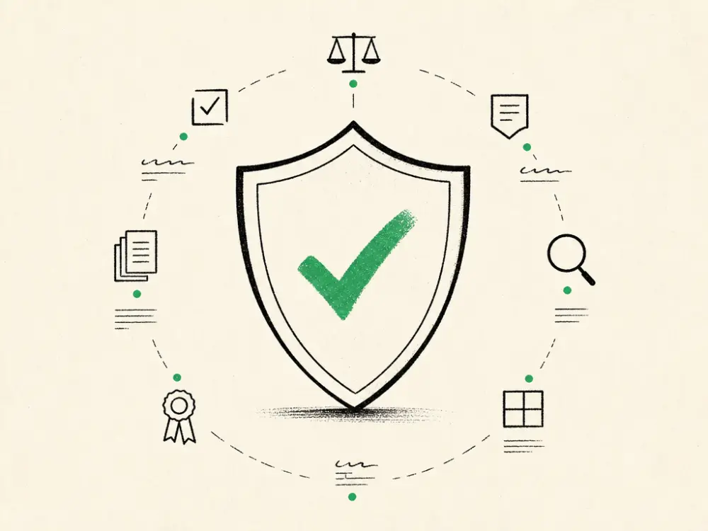 An ink shield crest with a green check at its centre, regulatory marks around