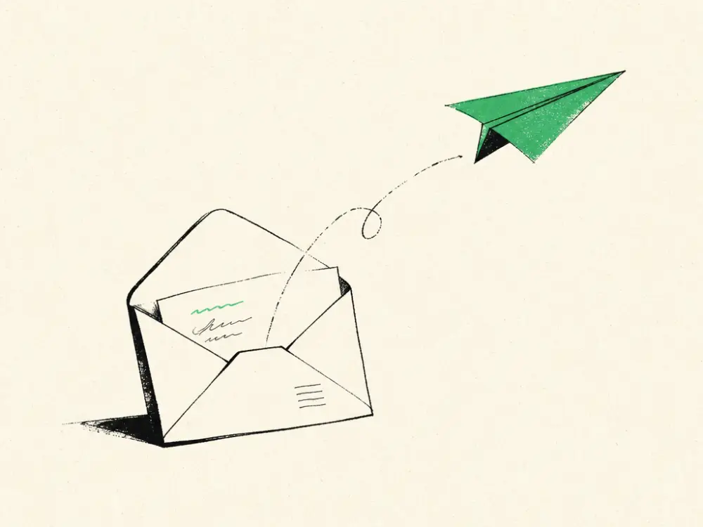 An open ink envelope with a small green paper plane lifting out of it