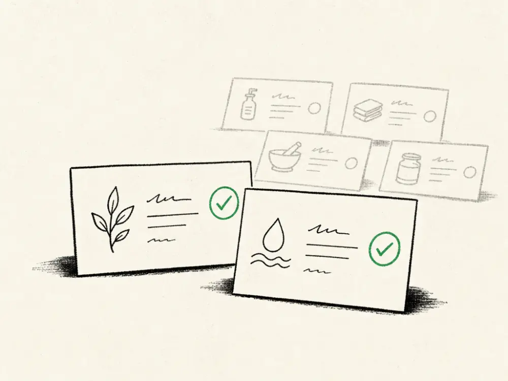 Two ink service cards ticked brand green, other small cards greyed and set aside