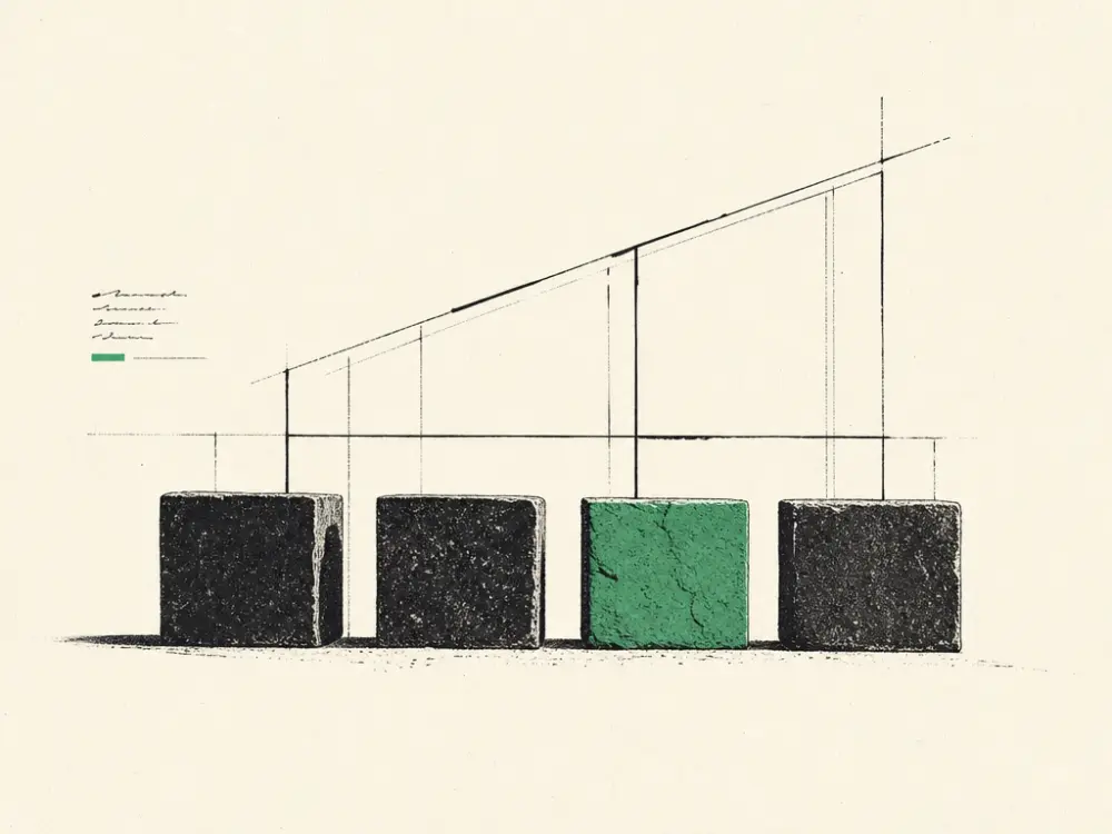Four ink stone foundation blocks supporting a structure, one block accented brand green